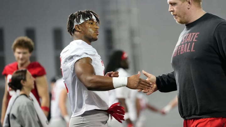 Mar 5, 2024; Columbus, OH, USA; Ohio State Buckeyes safety Caleb Downs (2) stretches during the first spring practice at the Woody Hayes Athletic Center.