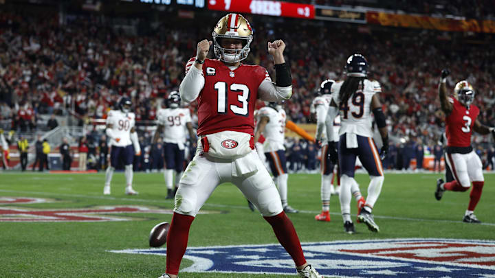 Dec 28, 2025; Santa Clara, California, USA; San Francisco 49ers quarterback Brock Purdy (13) celebrates after scoring a touchdown against the Chicago Bears in the first half at Levi's Stadium. Mandatory Credit: Sergio Estrada-Imagn Images