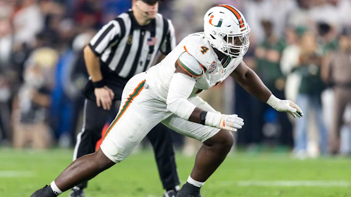 Jan 8, 2026; Glendale, AZ, USA; Miami Hurricanes defensive lineman Rueben Bain Jr. (4) against the Mississippi Rebels during the 2026 Fiesta Bowl and semifinal game of the College Football Playoff at State Farm Stadium. Mandatory Credit: Mark J. Rebilas-Imagn Images