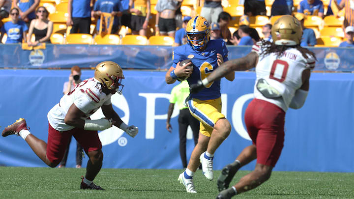 Oct 4, 2025; Pittsburgh, Pennsylvania, USA;  Pittsburgh Panthers quarterback Mason Heintschel (6) runs for a gain against the Boston College Eagles during the third quarter at Acrisure Stadium. Mandatory Credit: Charles LeClaire-Imagn Images