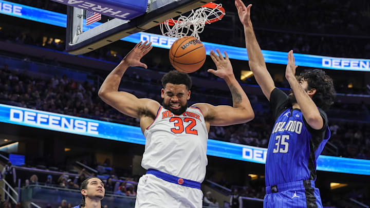New York Knicks center Karl-Anthony Towns (32) dunks during the second quarter against the Orlando Magic at Kia Center.