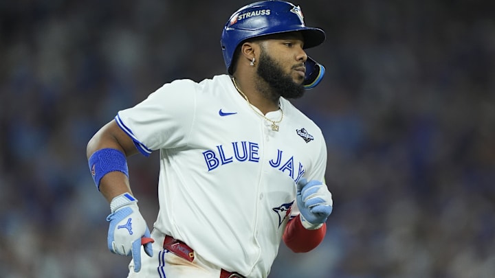 Nov 1, 2025; Toronto, Ontario, CAN; Toronto Blue Jays first baseman Vladimir Guerrero Jr. (27) walks to first base in the third inning against the Los Angeles Dodgers during game seven of the 2025 MLB World Series at Rogers Centre. 
