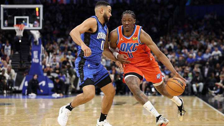 Dec 19, 2024; Orlando, Florida, USA; Oklahoma City Thunder forward Jalen Williams (8) is guarded by Orlando Magic guard Cory Joseph (10) in the fourth quarter at Kia Center. Mandatory Credit: Nathan Ray Seebeck-Imagn Images
