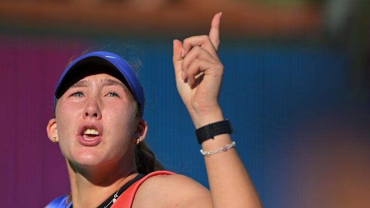 Mirra Andreeva yells to the crowd Mirra Andreeva yells to the crowd