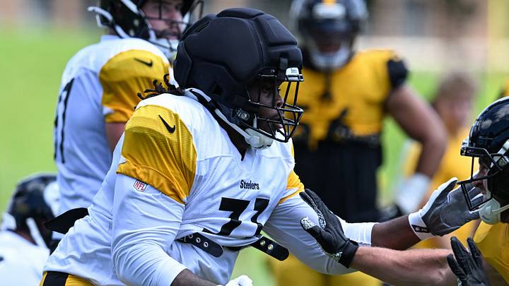 Aug 03, 2026; Latrobe, PA, USA; Pittsburgh Steelers offensive tackle Max Iheanachor (71) blocks linebacker T.J. Watt (90.)during a practice session at Training camp at Saint Vincent College. Mandatory Credit: Barry Reeger-Imagn Images Aug 03, 2026; Latrobe, PA, USA; Pittsburgh Steelers offensive tackle Max Iheanachor (71) blocks linebacker T.J. Watt (90.)during a practice session at Training camp at Saint Vincent College. Mandatory Credit: Barry Reeger-Imagn Images