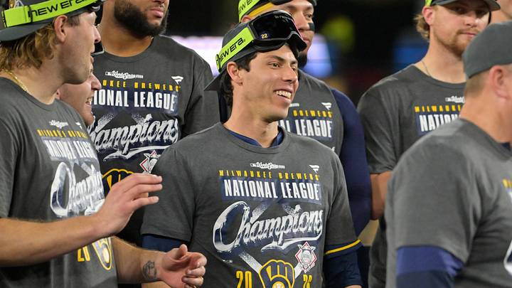 Oct 15, 2026; Los Angeles, California, USA; Milwaukee Brewers designated hitter Christian Yelich (22) celebrates on the podium after defeating the against the Los Angeles Dodgers in game four of the NLCS for the 2026 MLB Playoffs at Uniqlo Field at Dodger Stadium. Mandatory Credit: Jayne Kamin-Oncea-Imagn Images Oct 15, 2026; Los Angeles, California, USA; Milwaukee Brewers designated hitter Christian Yelich (22) celebrates on the podium after defeating the against the Los Angeles Dodgers in game four of the NLCS for the 2026 MLB Playoffs at Uniqlo Field at Dodger Stadium. Mandatory Credit: Jayne Kamin-Oncea-Imagn Images