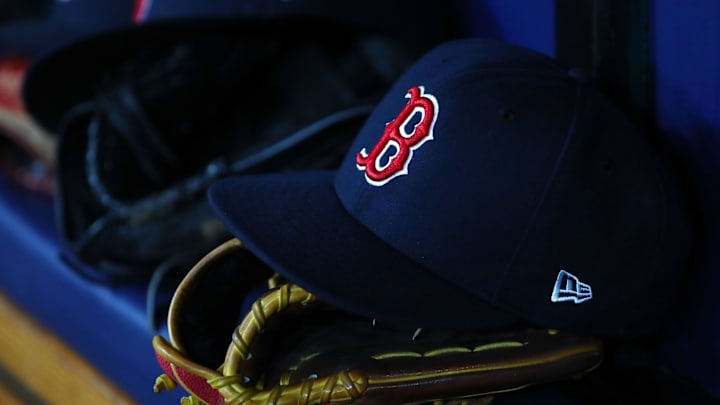Jul 22, 2019; St. Petersburg, FL, USA; A detail view of Boston Red Sox hat and glove laying in the dugout at Tropicana Field. Mandatory Credit: Kim Klement-Imagn Images Jul 22, 2019; St. Petersburg, FL, USA; A detail view of Boston Red Sox hat and glove laying in the dugout at Tropicana Field. Mandatory Credit: Kim Klement-Imagn Images