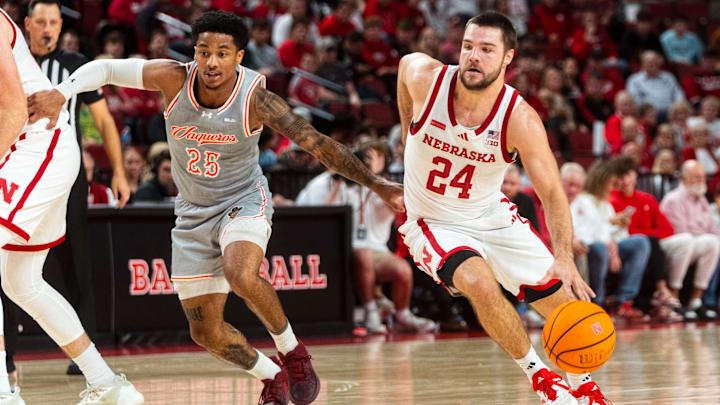 Nov 4, 2024; Lincoln, Nebraska, USA; Nebraska Cornhuskers guard Rollie Worster (24) drives against UT Rio Grande Valley Vaqueros guard Trey Miller (25) during the first half at Pinnacle Bank Arena.