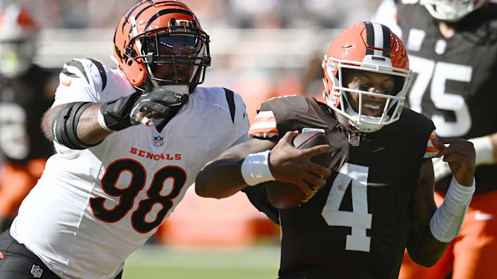 Oct 20, 2024; Cleveland, Ohio, USA; Cincinnati Bengals defensive tackle Sheldon Rankins (98) tackles Cleveland Browns quarterback Deshaun Watson (4) during the first half at Huntington Bank Field. Mandatory Credit: Ken Blaze-Imagn Images Oct 20, 2024; Cleveland, Ohio, USA; Cincinnati Bengals defensive tackle Sheldon Rankins (98) tackles Cleveland Browns quarterback Deshaun Watson (4) during the first half at Huntington Bank Field. Mandatory Credit: Ken Blaze-Imagn Images