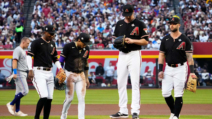 Arizona Diamondbacks starting pitcher Joe Mantiply (35) awaits on the mound during a pitching change