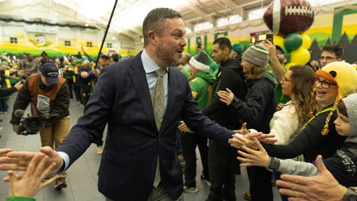 Oregon coach Dan Lanning greets fans at the Moshofsky Sports Center before the College Football Playoff game between Oregon and James Madison Dec. 20, 2025.