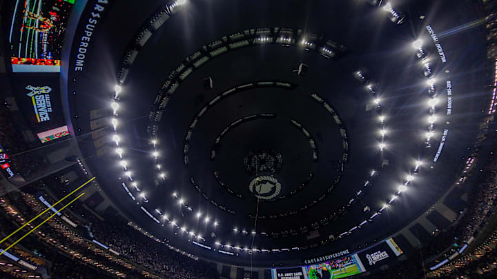 Nov 10, 2024; New Orleans, Louisiana, USA; Members of the US Army repel from the rafters during halftime of the game between the New Orleans Saints and the Atlanta Falcons at Caesars Superdome. Mandatory Credit: Stephen Lew-Imagn Images Nov 10, 2024; New Orleans, Louisiana, USA; Members of the US Army repel from the rafters during halftime of the game between the New Orleans Saints and the Atlanta Falcons at Caesars Superdome. Mandatory Credit: Stephen Lew-Imagn Images