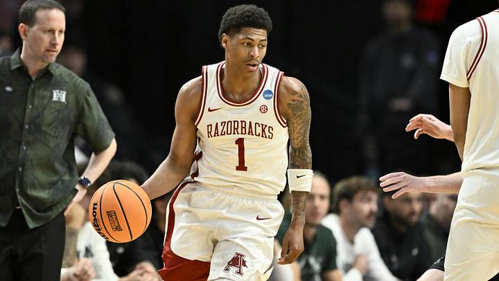 Mar 19, 2026; Portland, OR, USA; Arkansas Razorbacks guard Meleek Thomas (1) dribbles in the first half against the Hawaii Rainbow Warriors during a first round game of the men's 2026 NCAA Tournament at Moda Center. Mandatory Credit: Craig Strobeck-Imagn Images