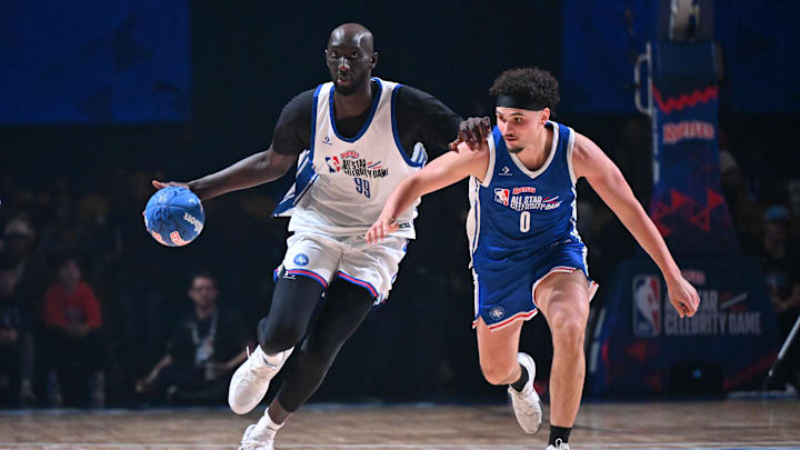 Feb 13, 2026; Los Angeles, CA, USA; Tacko Fall of Team 1 dribbles up the court as Adrien Nunez of Team 2 defends during the NBA All Star Celebrity Game at Kia Forum. Mandatory Credit: William Liang-Imagn Images Feb 13, 2026; Los Angeles, CA, USA; Tacko Fall of Team 1 dribbles up the court as Adrien Nunez of Team 2 defends during the NBA All Star Celebrity Game at Kia Forum. Mandatory Credit: William Liang-Imagn Images
