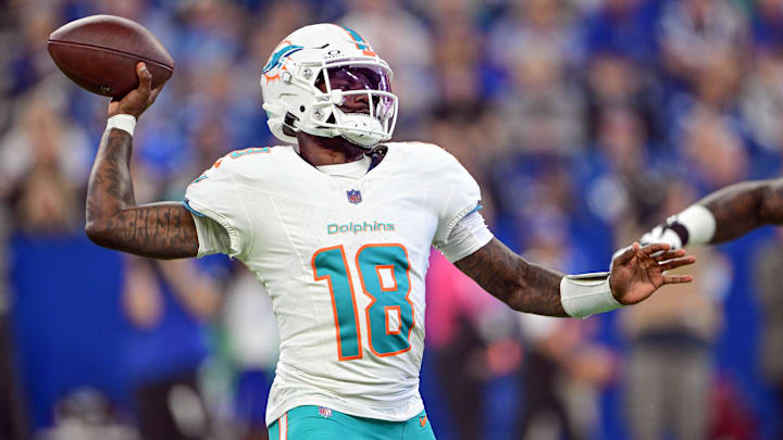 Oct 20, 2024; Indianapolis, Indiana, USA; Miami Dolphins quarterback Tyler "Snoop" Huntley (18) throws a pass during the first quarter against the Indianapolis Colts at Lucas Oil Stadium.
