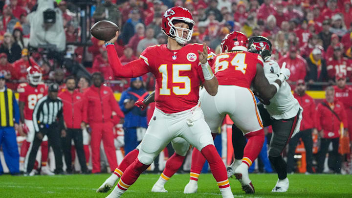 Nov 4, 2024; Kansas City, Missouri, USA; Kansas City Chiefs quarterback Patrick Mahomes (15) throws a pass against the Tampa Bay Buccaneers during the first half at GEHA Field at Arrowhead Stadium. Mandatory Credit: Denny Medley-Imagn Images