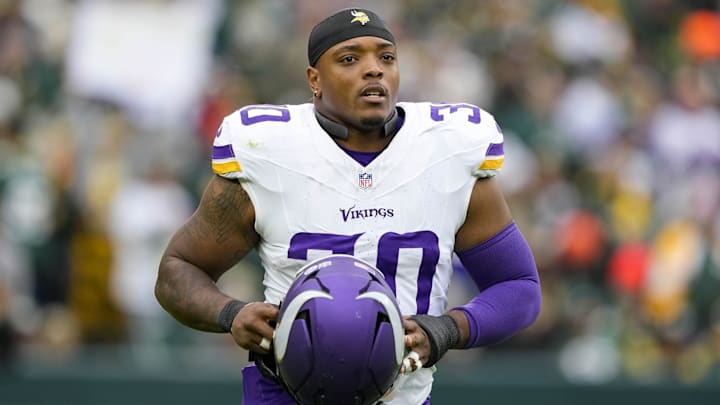 Nov 23, 2025; Green Bay, Wisconsin, USA;  Minnesota Vikings fullback C.J. Ham (30) during the game against the Green Bay Packers at Lambeau Field.