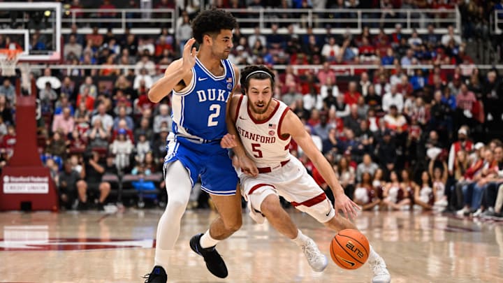 Jan 17, 2026; Stanford, California, USA; Stanford Cardinal guard Benny Gealer (5) dribbles against Duke Blue Devils guard Cayden Boozer (2) in the first half at Maples Pavilion. Mandatory Credit: Eakin Howard-Imagn Images