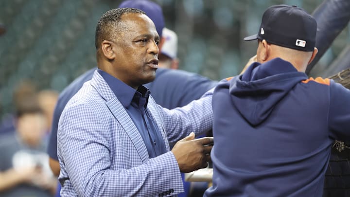 Mar 29, 2025; Houston, Texas, USA; Houston Astros general manager Dana Brown talks on the field before the game against the New York Mets at Daikin Park. 