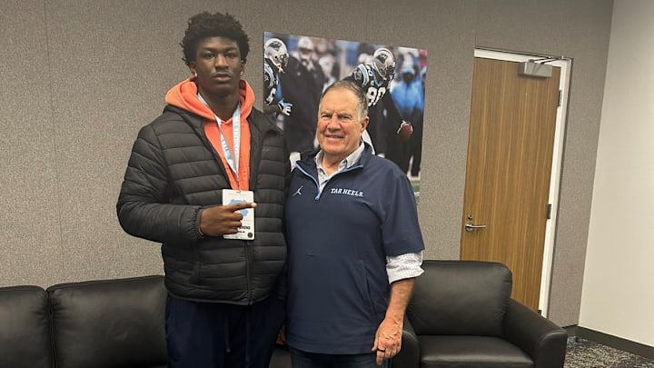 Tristian Givens and Bill Belichick share a moment on a North Carolina recruiting visit. 