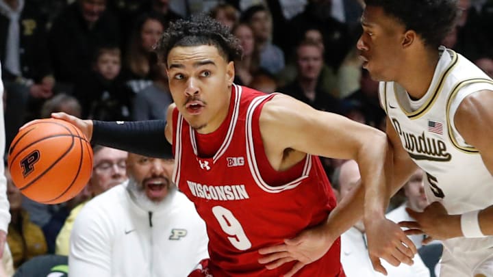Wisconsin Badgers guard John Tonje (9) drives past Purdue Boilermakers guard Myles Colvin (5) Saturday, Feb. 15, 2025, during the NCAA men’s basketball game at Mackey Arena in West Lafayette, Ind. Wisconsin Badgers guard John Tonje (9) drives past Purdue Boilermakers guard Myles Colvin (5) Saturday, Feb. 15, 2025, during the NCAA men’s basketball game at Mackey Arena in West Lafayette, Ind.
