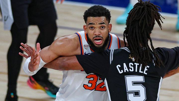Jun 8, 2026; New York, New York, USA; San Antonio Spurs guard Stephon Castle (5) guards New York Knicks center Karl-Anthony Towns (32) during game three of the 2026 NBA Finals at Madison Square Garden. Mandatory Credit: Vincent Carchietta-Imagn Images