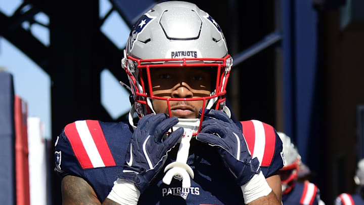 Sep 28, 2025; Foxborough, Massachusetts, USA; New England Patriots running back Treveyon Henderson (32) walks out onto the field for warmups prior to a game against the Carolina Panthers at Gillette Stadium.