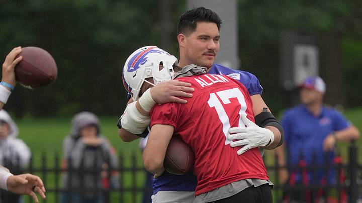 Bills Connor McGovern gives quarterback Josh Allen a hug as part of their ritual greeting during Bills Training Camp at St. John Fisher University on July 30, 2026 in Pittsford. Bills Connor McGovern gives quarterback Josh Allen a hug as part of their ritual greeting during Bills Training Camp at St. John Fisher University on July 30, 2026 in Pittsford.