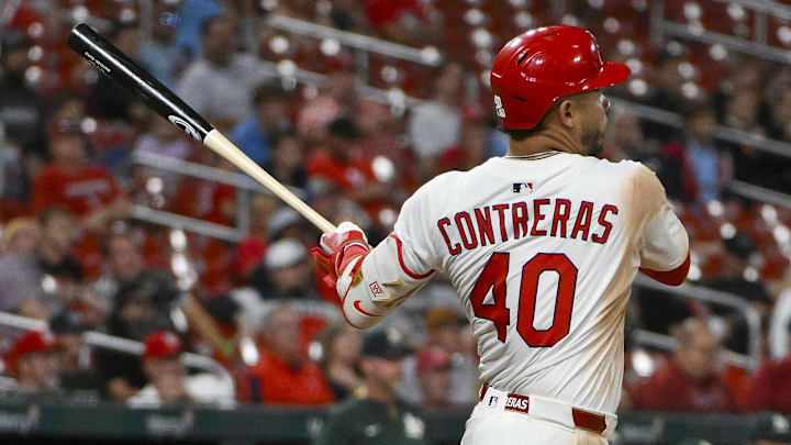 Sep 3, 2025; St. Louis, Missouri, USA;  St. Louis Cardinals first baseman Willson Contreras (40) hits a two run triple against the Athletics during the eighth inning at Busch Stadium. Mandatory Credit: Jeff Curry-Imagn Images