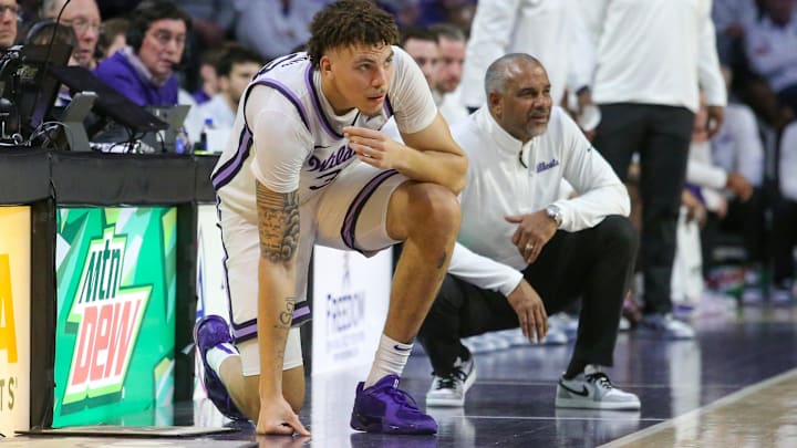 Jan 11, 2025; Manhattan, Kansas, USA; Kansas State Wildcats forward Coleman Hawkins (33) waits to come into the first half of a game against the Houston Cougars at Bramlage Coliseum. Mandatory Credit: Scott Sewell-Imagn Images