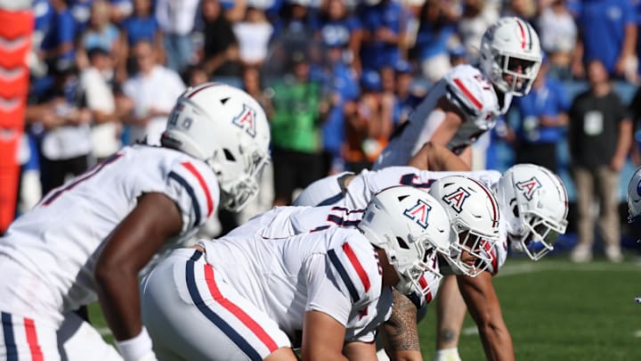 Oct 12, 2024; Provo, Utah, USA; The Arizona Wildcats defense lines up against the Brigham Young Cougars offense during the second quarter at LaVell Edwards Stadium. Mandatory Credit: Rob Gray-Imagn Images