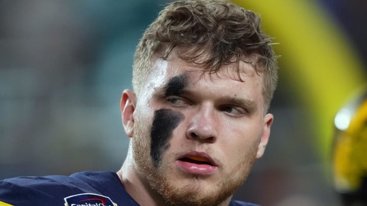 Dec 31, 2021; Miami Gardens, FL, USA; Michigan Wolverines defensive end Aidan Hutchinson (97) warms up prior to the Orange Bowl college football CFP national semifinal game against the Georgia Bulldogs at Hard Rock Stadium. Mandatory Credit: Jasen Vinlove-USA TODAY Sports Dec 31, 2021; Miami Gardens, FL, USA; Michigan Wolverines defensive end Aidan Hutchinson (97) warms up prior to the Orange Bowl college football CFP national semifinal game against the Georgia Bulldogs at Hard Rock Stadium. Mandatory Credit: Jasen Vinlove-USA TODAY Sports