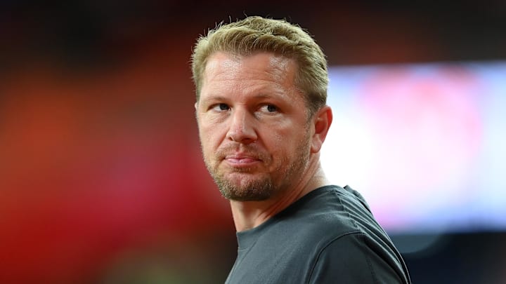 Offensive coordinator Jason Beck.