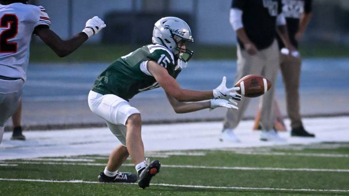 West Allis Hale wide receiver Carson Cotey (15) turns back for a catch but can’t make it against Kaukauna in a nonconference game Friday, August 21, 2026, at the West Allis Athletic Complex in West Allis, Wisconsin. West Allis Hale wide receiver Carson Cotey (15) turns back for a catch but can’t make it against Kaukauna in a nonconference game Friday, August 21, 2026, at the West Allis Athletic Complex in West Allis, Wisconsin.