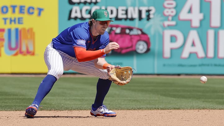 Mar 17, 2025; Port St. Lucie, Florida, USA; New York Mets third base Brett Baty (7) fields a ground ball during the fifth inning against the Tampa Bay Rays at Clover Park. Mandatory Credit: Reinhold Matay-Imagn Images Mar 17, 2025; Port St. Lucie, Florida, USA; New York Mets third base Brett Baty (7) fields a ground ball during the fifth inning against the Tampa Bay Rays at Clover Park. Mandatory Credit: Reinhold Matay-Imagn Images