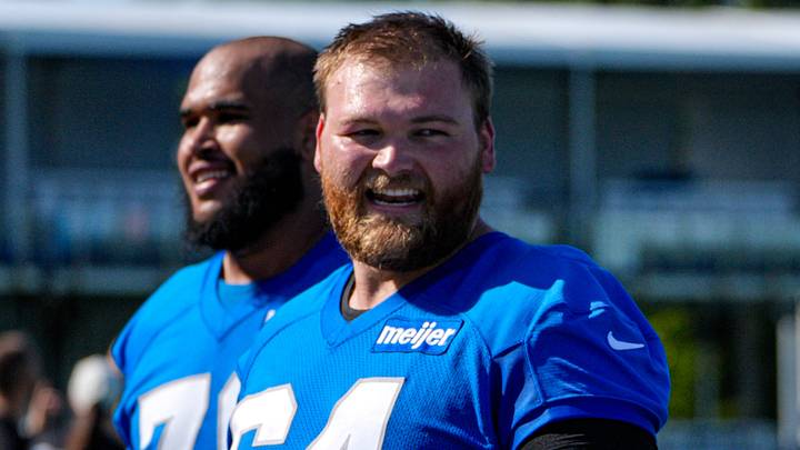 Detroit Lions center Cade Mays (64), left, talks to offensive tackle Penei Sewell (58) as they walk off the field after practice during training camp at Meijer Performance Center in Allen Park on Wednesday, July 29, 2026. Detroit Lions center Cade Mays (64), left, talks to offensive tackle Penei Sewell (58) as they walk off the field after practice during training camp at Meijer Performance Center in Allen Park on Wednesday, July 29, 2026.