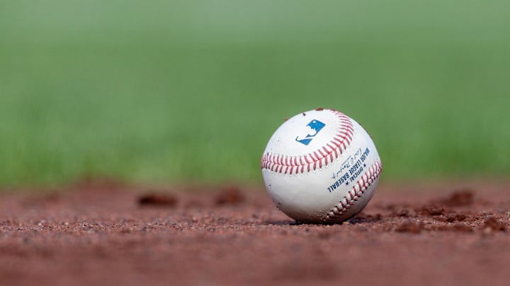 Jul 27, 2025; San Francisco, California, USA; A MLB baseball sits on the infield during the game between the San Francisco Giants and the New York Mets at Oracle Park. Mandatory Credit: Bob Kupbens-Imagn Images