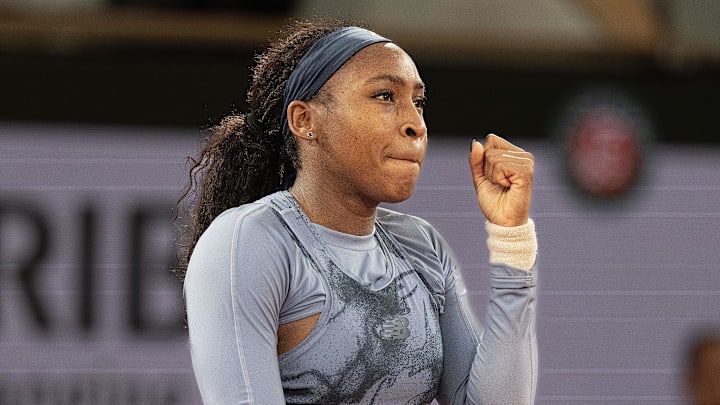 Coco Gauff celebrates winning a French Open quarterfinal match.