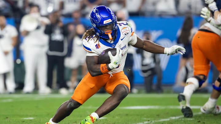 Dec 31, 2024; Glendale, AZ, USA; Boise State Broncos running back Ashton Jeanty (2) against the Penn State Nittany Lions during the Fiesta Bowl at State Farm Stadium. Mandatory Credit: Mark J. Rebilas-Imagn Images