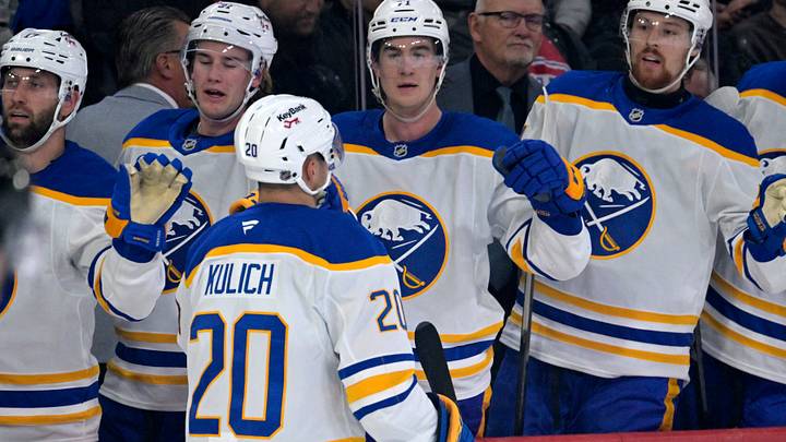 Oct 20, 2025; Montreal, Quebec, CAN; Buffalo Sabres forward Jiri Kulich (20) celebrates with teammates after scoring a goal against the Montreal Canadiens during the second period at the Bell Centre. Mandatory Credit: Eric Bolte-Imagn Images
