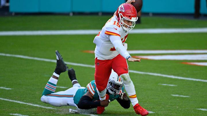 Miami Dolphins outside linebacker Jerome Baker (55) sacks Kansas City Chiefs quarterback Patrick Mahomes (15) during the first half at Hard Rock Stadium.