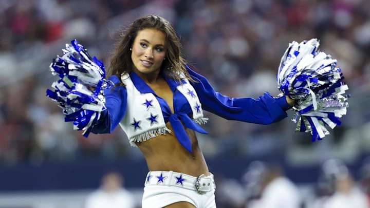 Dallas Cowboys cheerleader performs during the first half against the Houston Texans 