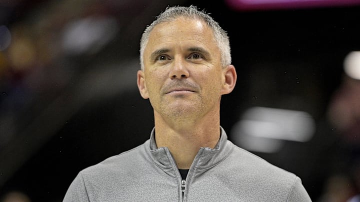 Mar 9, 2024; Tallahassee, Florida, USA; Florida State Seminoles head football coach Mike Norvell accepts the Bear Bryant coach of the Year award during a media timeout of a basketball game against the Miami Hurricanes at Donald L. Tucker Center. Mandatory Credit: Melina Myers-Imagn Images
