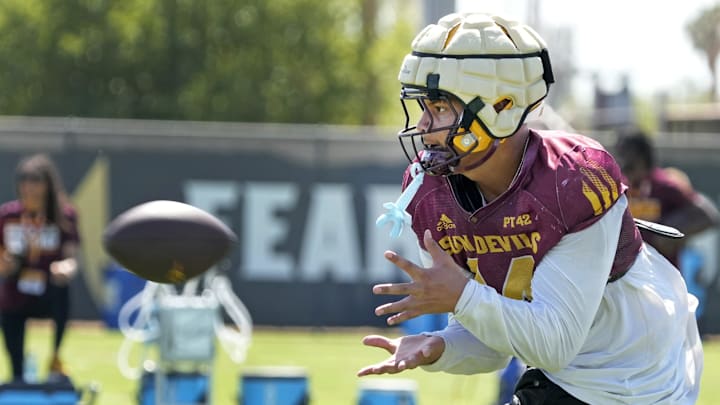 Arizona State tight end Aj Ia (14) trains during football practice at Kajikawa practice fields in Tempe on Aug 1, 2025.