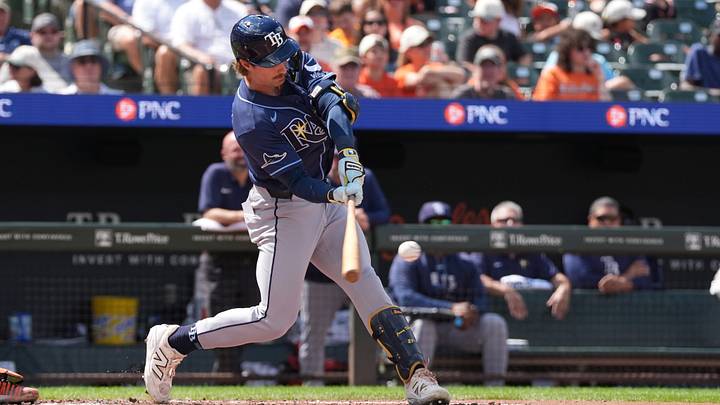 Aug 23, 2026; Baltimore, Maryland, USA; Tampa Bay Rays right fielder Jonny DeLuca (21) hits a single against the Baltimore Orioles during the fifth inning at Oriole Park at Camden Yards. Mandatory Credit: Gregory Fisher-Imagn Images Aug 23, 2026; Baltimore, Maryland, USA; Tampa Bay Rays right fielder Jonny DeLuca (21) hits a single against the Baltimore Orioles during the fifth inning at Oriole Park at Camden Yards. Mandatory Credit: Gregory Fisher-Imagn Images