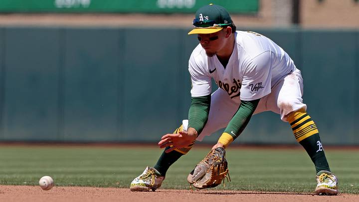 Jun 22, 2025; West Sacramento, California, USA; Athletics second baseman Luis Urias (17) fields a ground ball against the Cleveland Guardians during the seventh inning at Sutter Health Park. Mandatory Credit: Dennis Lee-Imagn Images Jun 22, 2025; West Sacramento, California, USA; Athletics second baseman Luis Urias (17) fields a ground ball against the Cleveland Guardians during the seventh inning at Sutter Health Park. Mandatory Credit: Dennis Lee-Imagn Images