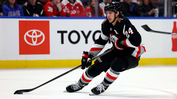 Jan 6, 2025; Buffalo, New York, USA;  Buffalo Sabres center Dylan Cozens (24) looks to take a shot on goal during the second period against the Washington Capitals at KeyBank Center. Mandatory Credit: Timothy T. Ludwig-Imagn Images
