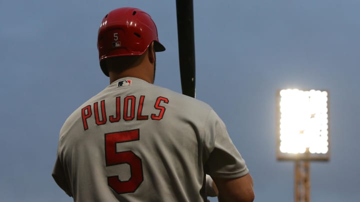 Oct 3, 2022; Pittsburgh, Pennsylvania, USA; St. Louis Cardinals designated hitter Albert Pujols (5) in the on-deck circle against the Pittsburgh Pirates during the first inning at PNC Park. Mandatory Credit: Charles LeClaire-USA TODAY Sports Oct 3, 2022; Pittsburgh, Pennsylvania, USA; St. Louis Cardinals designated hitter Albert Pujols (5) in the on-deck circle against the Pittsburgh Pirates during the first inning at PNC Park. Mandatory Credit: Charles LeClaire-USA TODAY Sports
