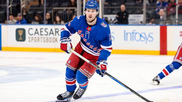 Apr 5, 2026; New York, New York, USA; New York Rangers left wing Alexis Lafreniere (13) skates against the Washington Capitals during the second period at Madison Square Garden. Mandatory Credit: Danny Wild-Imagn Images