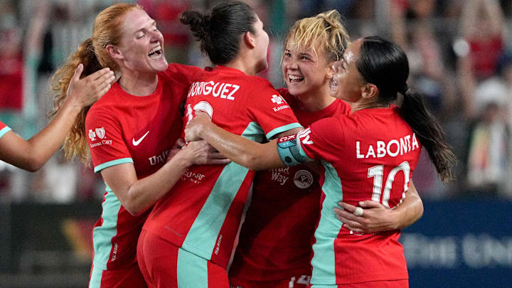 Aug 1, 2024; Kansas City, Missouri, USA; Kansas City Current midfielder Claire Hutton (right) celebrates her goal against Tigres UANL during the second half at CPKC Stadium. Mandatory Credit: Denny Medley-USA TODAY Sports